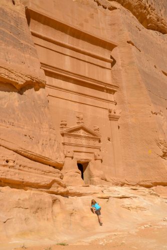 Girl climbing tomb Saudi Arabia
