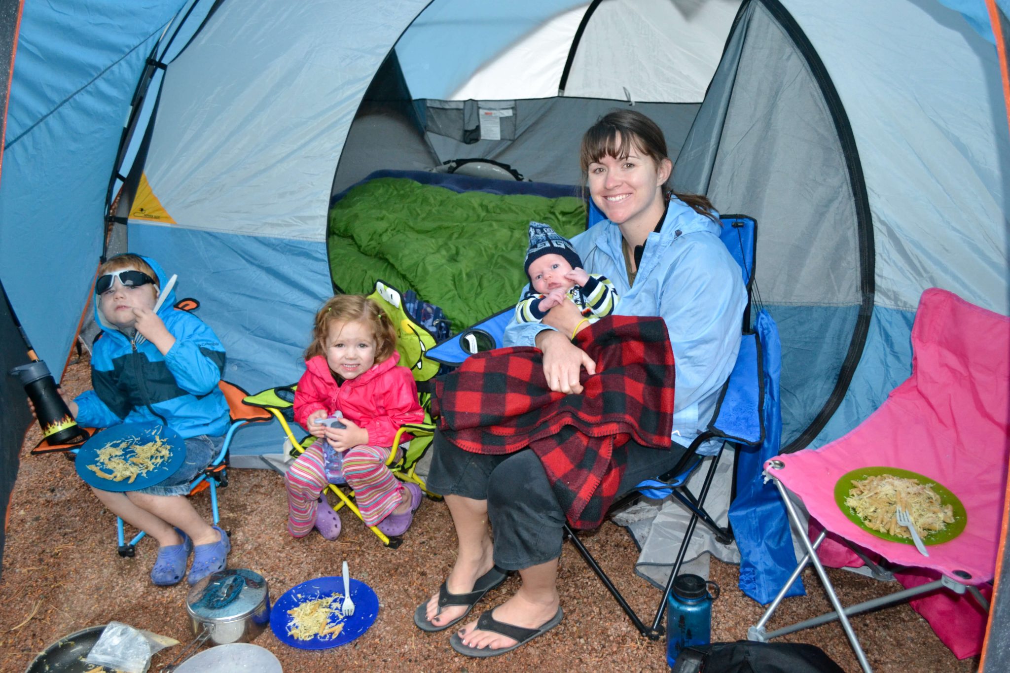 mom camping with baby and kids
