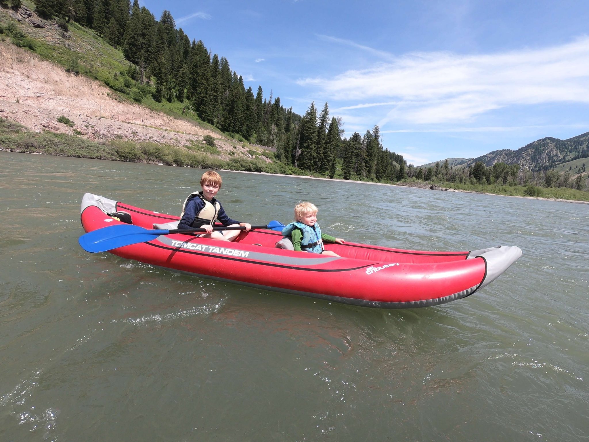kids kayaking together